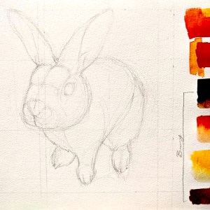 Sketch of a bunny on watercolor paper with paint swatches to the right in ochres, reds and browns.
